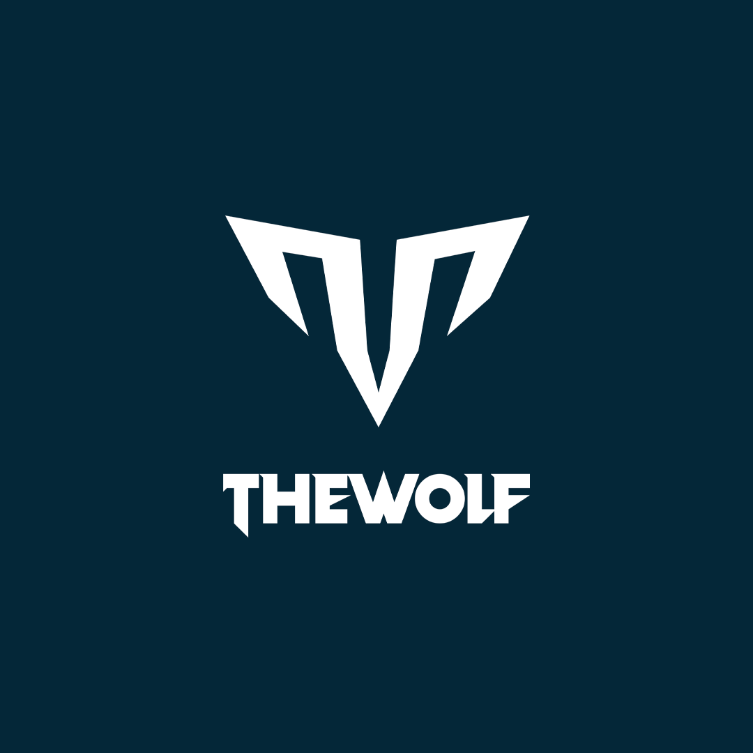 THE WOLF CORP